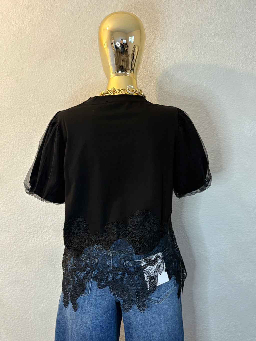 Celeste black top